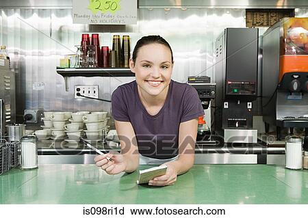 Smiling waitress in a diner View Large Photo Image Stock Image - Smiling waitress in a diner. Fotosearch