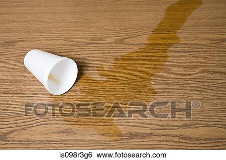 Stock Photograph - Spilt cup of coffee. Fotosearch