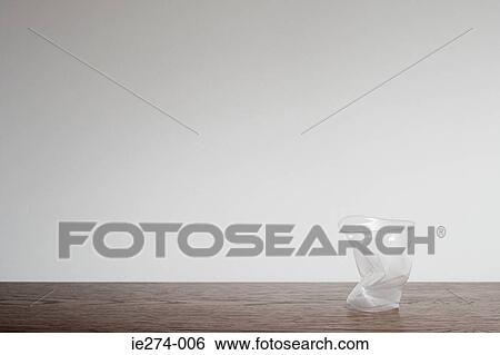 Squashed plastic cup View Large Photo Image Stock Photograph - Squashed plastic cup. Fotosearch