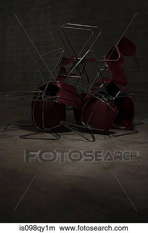 Stack of chairs View Large Photo Image Picture - Stack of chairs. Fotosearch