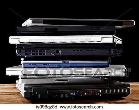 Stack of laptop computers View Large Photo Image Stock Image - Stack of laptop computers. Fotosearch