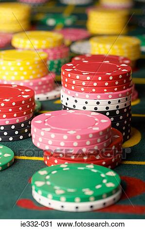 Stacked gambling chips View Large Photo Image Stock Image - Stacked gambling chips. Fotosearch