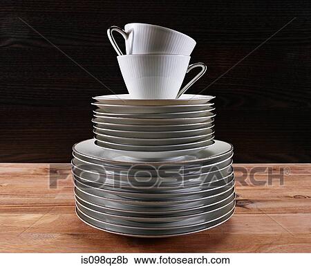 Stacked tea cups and plates View Large Photo Image Stock Image - Stacked tea cups and plates. Fotosearch