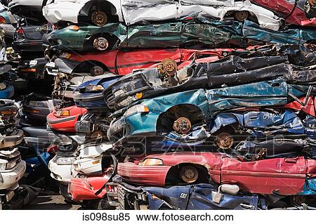 Stacks of crushed cars View Large Photo Image Stock Photography - Stacks of crushed cars. Fotosearch