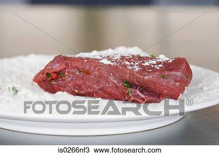 Steak and flour and plate View Large Photo Image Stock Image - Steak and flour and plate. Fotosearch