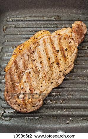 Steak cooking View Large Photo Image Stock Image - Steak cooking. Fotosearch