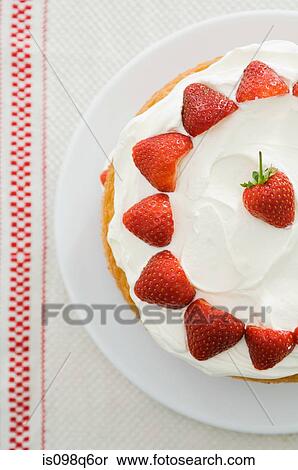 Stock Photography - Strawberries on cake. Fotosearch
