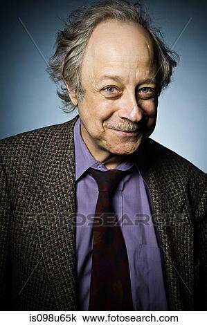 Studio portrait of cheerful senior man View Large Photo Image Stock Image - Studio portrait of cheerful senior man. Fotosearch