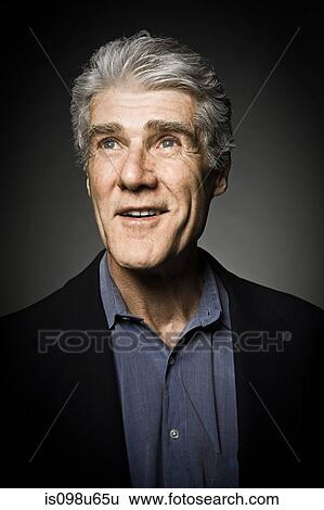 Studio portrait of cheerful senior man View Large Photo Image Stock Photograph - Studio portrait of cheerful senior man. Fotosearch