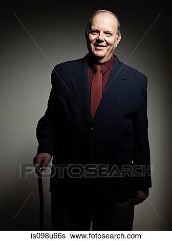 Studio portrait of cheerful senior man View Large Photo Image Stock Photograph - Studio portrait of cheerful senior man. Fotosearch
