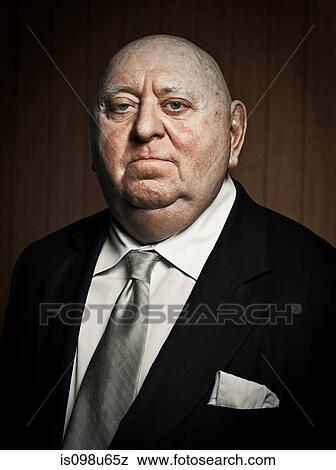 Studio portrait of confident senior man View Large Photo Image Stock Photo - Studio portrait of confident senior man. Fotosearch