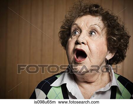 Studio portrait of shocked senior woman View Large Photo Image Picture - Studio portrait of shocked senior woman. Fotosearch