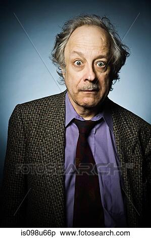 Stock Photography - Studio portrait of surprised senior man. Fotosearch