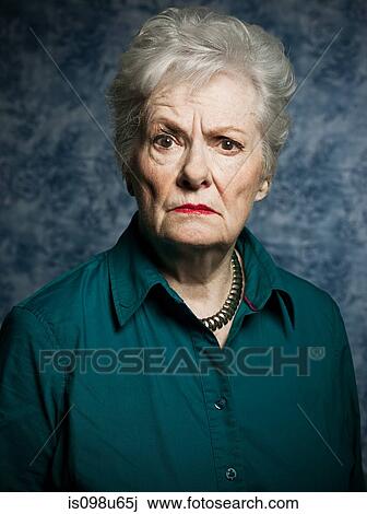 Stuido portrait of angry senior woman View Large Photo Image Stock Image - Stuido portrait of angry senior woman. Fotosearch