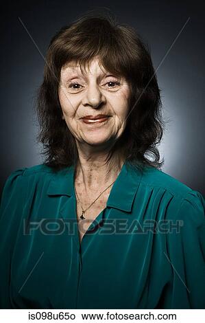 Stuido portrait of cheerful senior woman View Large Photo Image Picture - Stuido portrait of cheerful senior woman. Fotosearch
