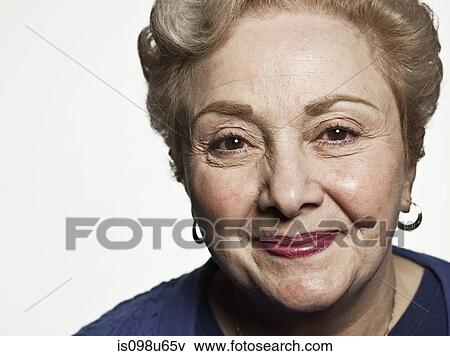 Stuido portrait of cheerful senior woman View Large Photo Image Stock Photo - Stuido portrait of cheerful senior woman. Fotosearch