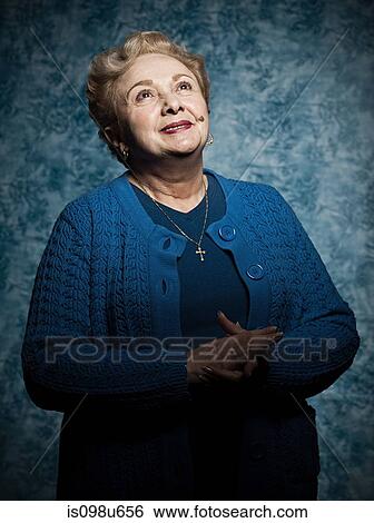 Stuido portrait of cheerful senior woman View Large Photo Image Stock Photograph - Stuido portrait of cheerful senior woman. Fotosearch
