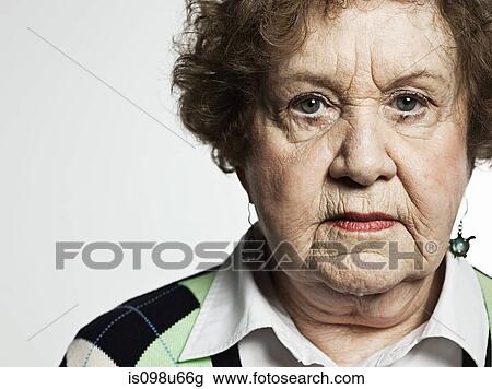 Stuido portrait of serious senior woman View Large Photo Image Stock Image - Stuido portrait of serious senior woman. Fotosearch