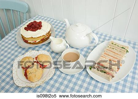Tea with sandwiches and cakes View Large Photo Image Stock Photography - Tea with sandwiches and cakes. Fotosearch