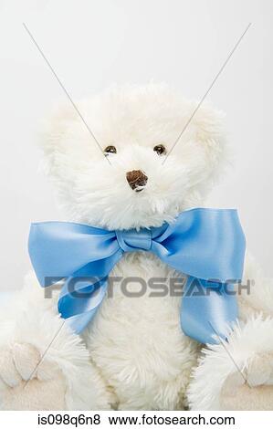 Teddy bear with a bow View Large Photo Image Stock Photo - Teddy bear with a bow. Fotosearch