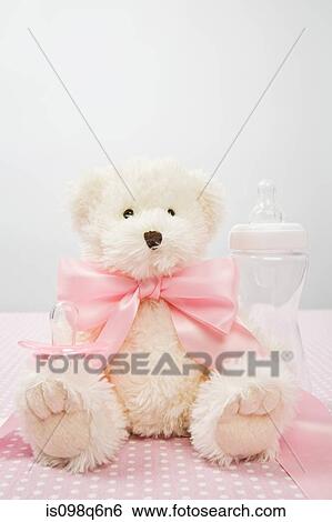 Teddy bear with a bow View Large Photo Image Stock Photograph - Teddy bear with a bow. Fotosearch