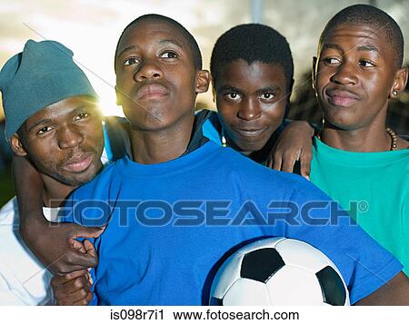 Teenage boys with football View Large Photo Image Stock Image - Teenage boys with football. Fotosearch