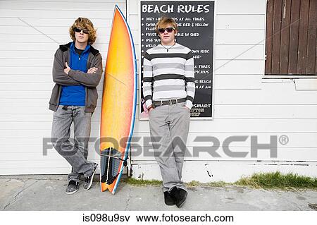Teenage boys with surfboard View Large Photo Image Stock Photo - Teenage boys with surfboard. Fotosearch