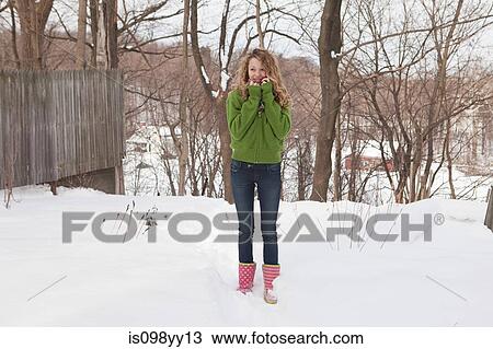Teenage girl in snow, portrait View Large Photo Image Stock Image - Teenage girl in snow, portrait. Fotosearch