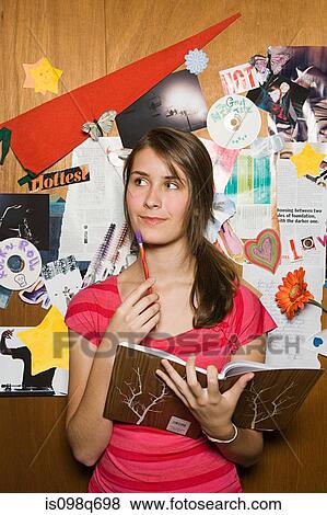 Teenage girl with diary View Large Photo Image Stock Photo - Teenage girl with diary. Fotosearch