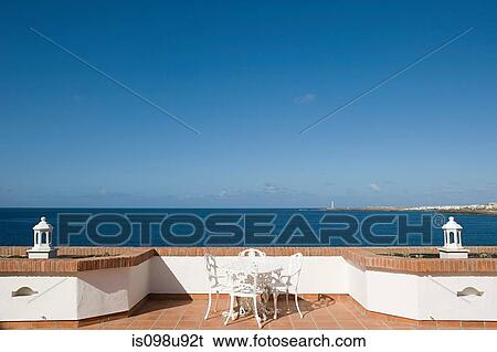 Terrace and view over ocean, Playa Blanca, Lanzarote View Large Photo Image Stock Photograph - Terrace and view over ocean, Playa Blanca, Lanzarote. Fotosearch