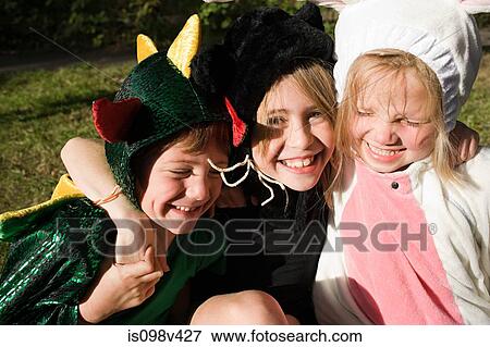 Three children in fancy dress costume View Large Photo Image Stock Photo - Three children in fancy dress costume. Fotosearch