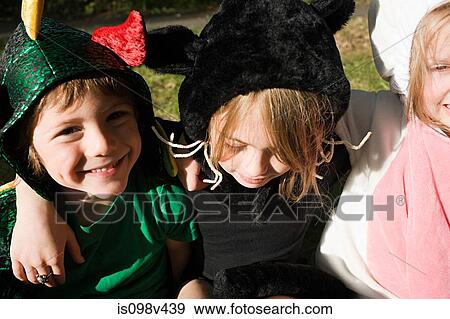 Three children in fancy dress costume View Large Photo Image Stock Photo - Three children in fancy dress costume. Fotosearch