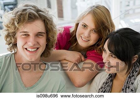 Three teenage friends View Large Photo Image Stock Photograph - Three teenage friends. Fotosearch