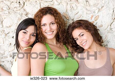 Stock Image - Three young women. Fotosearch