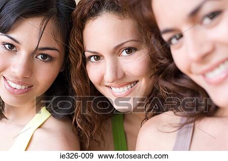 Stock Photo - Three young women. Fotosearch