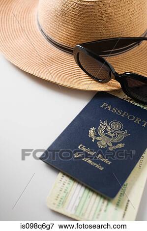 Tickets passport straw hat and sunglasses View Large Photo Image Stock Photo - Tickets passport straw hat and sunglasses. Fotosearch