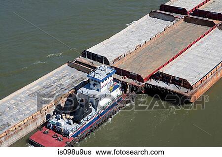 Stock Photograph - Tugboat and barges. Fotosearch
