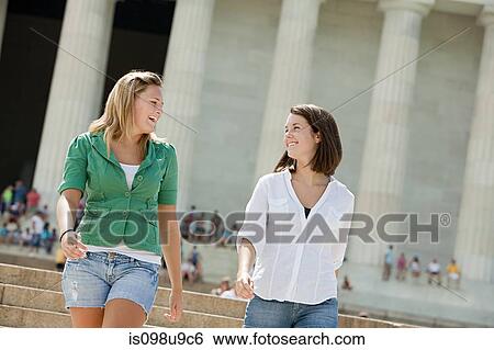 Stock Photograph - Two girls at lincoln memorial. Fotosearch