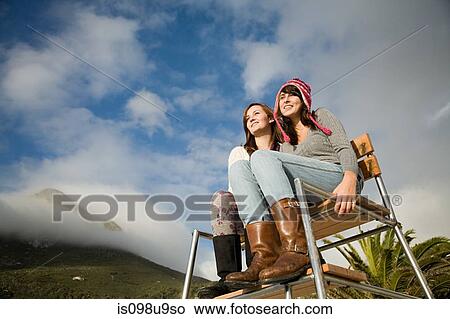Picture - Two girls on lifeguard tower. Fotosearch