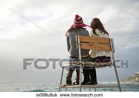 Two girls on lifeguard tower View Large Photo Image Stock Image - Two girls on lifeguard tower. Fotosearch