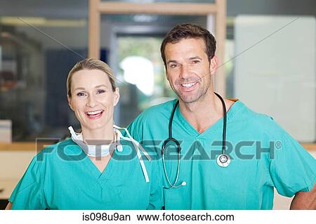 Two surgeons smiling View Large Photo Image Picture - Two surgeons smiling. Fotosearch