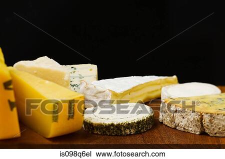 Variety of cheeses View Large Photo Image Stock Image - Variety of cheeses. Fotosearch