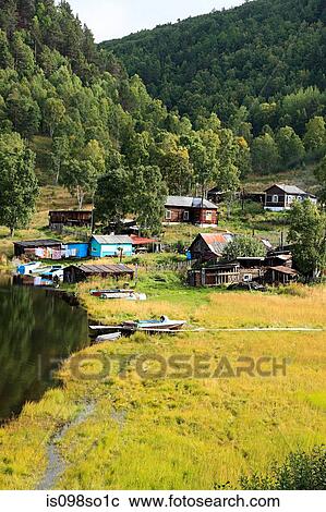 Stock Image - Village by lake baikal. Fotosearch