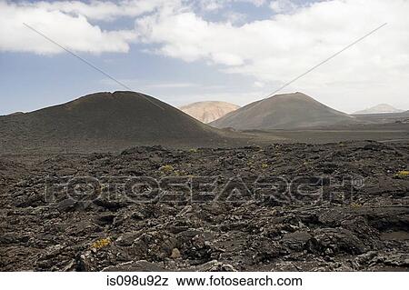 Volcanic landscape of Timanfaya National Park, Lanzarote View Large Photo Image Stock Photo - Volcanic landscape of Timanfaya National Park, Lanzarote. Fotosearch