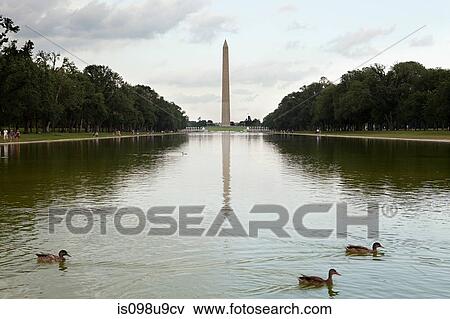 Stock Photo - Washington monument and reflecting pool, Washington DC, USA. Fotosearch