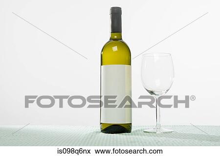 Wine bottle and glass View Large Photo Image Stock Photo - Wine bottle and glass. Fotosearch