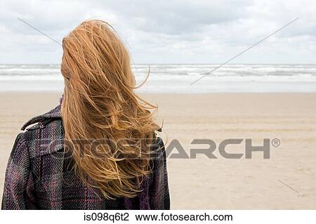 Woman at the coast View Large Photo Image Stock Image - Woman at the coast. Fotosearch