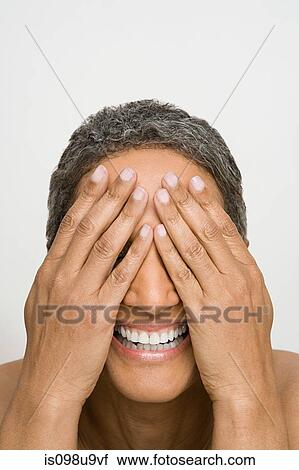 Woman covering eyes View Large Photo Image Stock Image - Woman covering eyes. Fotosearch