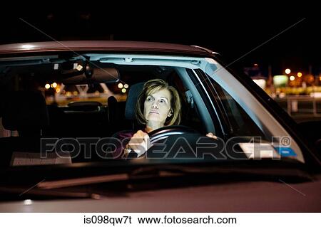 Stock Photograph - Woman in car. Fotosearch