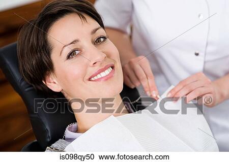 Woman in dentists office View Large Photo Image Stock Image - Woman in dentists office. Fotosearch